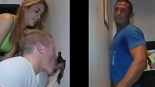 Sexy babe watches as Gays suck and blow cock through gloryhole