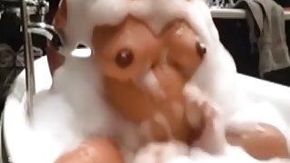 Fucking and licking my wife in the tub covered in soap suds