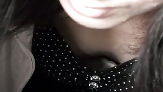 Mature Asian shows her small tits in this cleavage spy shot