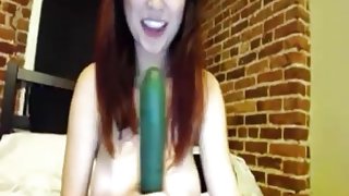 Big tits girl suck cucumber