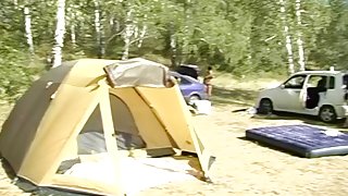 Slutty pair of undressed students fucking in the tent