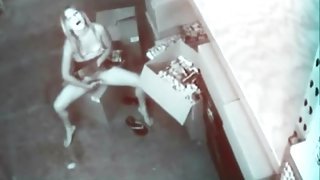 Slut in skirt masturbates on security camera